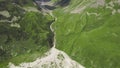 Top view on line of melt water in mountainous landscapes. Clip. Large fork in mountain bed from meltwater flowing down Royalty Free Stock Photo