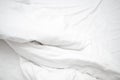 Top view of linel wrinkled bed. White wrinkles bedding sheets