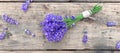 little bouquet of lavender flowers on wooden background Royalty Free Stock Photo