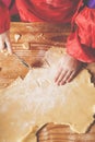 Top view of little chef girl preparing sweet desert at home kitchen Royalty Free Stock Photo