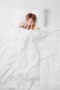 Top view of little scared by nightmares boy under Royalty Free Stock Photo