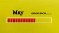 Top view of loading bar showing the end of May month with yellow paper background. Royalty Free Stock Photo
