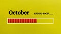 Top view of loading bar showing the end of October month with yellow paper background. Royalty Free Stock Photo