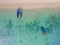 Top view at longtail boats in a blue ocean at the beach of Koh Ngai island Thailand Royalty Free Stock Photo