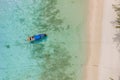 Top view at longtail boats in a blue ocean at the beach of Koh Ngai island Thailand Royalty Free Stock Photo