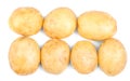 Top view of a lot of fresh and organic potatoes, isolated on a white background. New potatoes, close-up. Fresh vegetables. Royalty Free Stock Photo