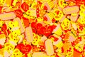 Top view of lots of colourful foam stickers depicting hearts, butterflies and cupcakes. Summer or joy concept Royalty Free Stock Photo