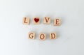 Top view. Love God concept spelled by wooden letter cubes or blocks Royalty Free Stock Photo
