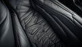 Top view of luxury sport car front passenger leather seat with detail high end fabric and stitch texture along with blurred