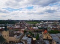Lviv bird`s-eye view. Lviv old town from above. Panorama of old city of Lviv. Wonderful scenic image trees foliage old gothic styl