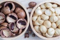 Top view macadamia nuts and shell in wooden bowl Royalty Free Stock Photo