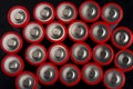 Top View Macro Image of Silver and Red AA Batteries Royalty Free Stock Photo