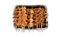 Top-view macro photography of dried cuttlefish BBQ roasted skewer grill topped with spicy dipping sauce Royalty Free Stock Photo