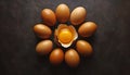 Top view macro shot of eggs with one chicken egg broken with yolk Royalty Free Stock Photo