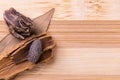 Top view macro shot of herbal pills and tablets arranged with spices on a red stone. Unani medicines concept Royalty Free Stock Photo