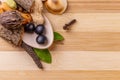 Top view macro shot of herbal pills and tablets arranged with spices on a red stone. Unani medicines concept Royalty Free Stock Photo