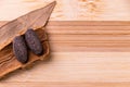 Top view macro shot of herbal pills and tablets arranged with spices on a red stone. Unani medicines concept Royalty Free Stock Photo