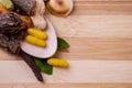 Top view macro shot of herbal pills and tablets arranged with spices on a red stone. Unani medicines concept Royalty Free Stock Photo