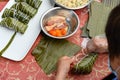 Madam making traditional Chinese ZongZi for Dragon Boat Festival ie DuanWu festival