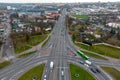 Top view of a major road junction in the city during the day. A large busy roundabout. Urban traffic and infrastructure. Green Royalty Free Stock Photo