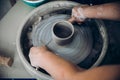 Top view making ceramic pot on potter wheel. Place to work Cut string. Royalty Free Stock Photo
