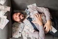 Top view of a man enjoying his money Royalty Free Stock Photo