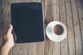 Top view man hand overhead office desk laptop, coffee cup on wood table copy space. Tabletop notebook laptop coffee cup to officer