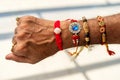 Top View Of A Man`s Hand Covered With Rakhi