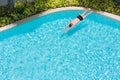Top view of a man in the swimming pool. Royalty Free Stock Photo