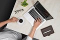 Top view of man using a modern portable computer in home office Royalty Free Stock Photo