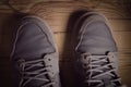 Top view of a man wearing a pair of sneakers Royalty Free Stock Photo