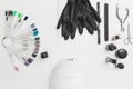 Top view of manicure accessories lying on white table. Beauty salon Royalty Free Stock Photo