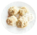 Top view of manti dumpling on white plate isolated Royalty Free Stock Photo