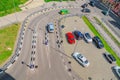 Top view of many cars parked on a parking lot. Cars on the city street aerial. Kharkiv, Ukraine 07-07-2023 Royalty Free Stock Photo