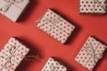 Top view of many Christmas gifts on a red background with copy space. Royalty Free Stock Photo