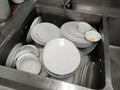 Top view many dirty dishes in the kitchen sink Royalty Free Stock Photo