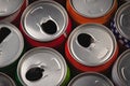 Top view of many opened aluminium cans of beer or soda. One of them is with american flag print