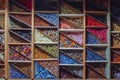 Many various colorful beads in wooden storage box Royalty Free Stock Photo