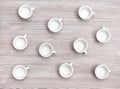Top view of many white cups on gray brown table Royalty Free Stock Photo