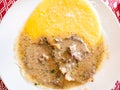 top view of Manzo all 'Olio with polenta close up