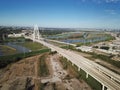 Top view Margaret Hunt Hill, Ronald Kirk Bridge and Sylvan Avenue with suburbs of downtown Dallas, Texas in background Royalty Free Stock Photo