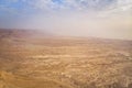 Top view from Masada fortress to the Judaean desert and the Dead Sea. The desert land of Israel. Background of canyon in the Royalty Free Stock Photo