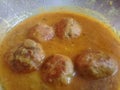 Top view of Meat balls or meat kofta curry on a black background