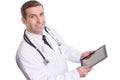 Top view of medical doctor using tablet pc with empty screen / I Royalty Free Stock Photo