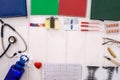 Top view at medical results and notepads on table