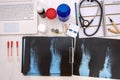 Top view at medical results and notepads on table