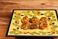 Six homemade, freshly baked clams casino on plate
