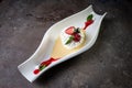 top view meringue dessert with strawberries on a dark concrete background