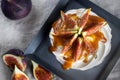Top view on a meringue figs with whipped cream and caremel glaze Royalty Free Stock Photo