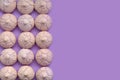 Meringues arranged on colored background with copy space on the right